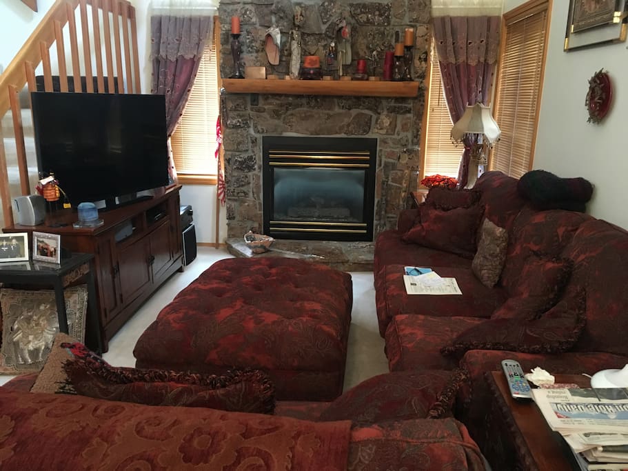 Great family room with access to outdoor deck and barbecue