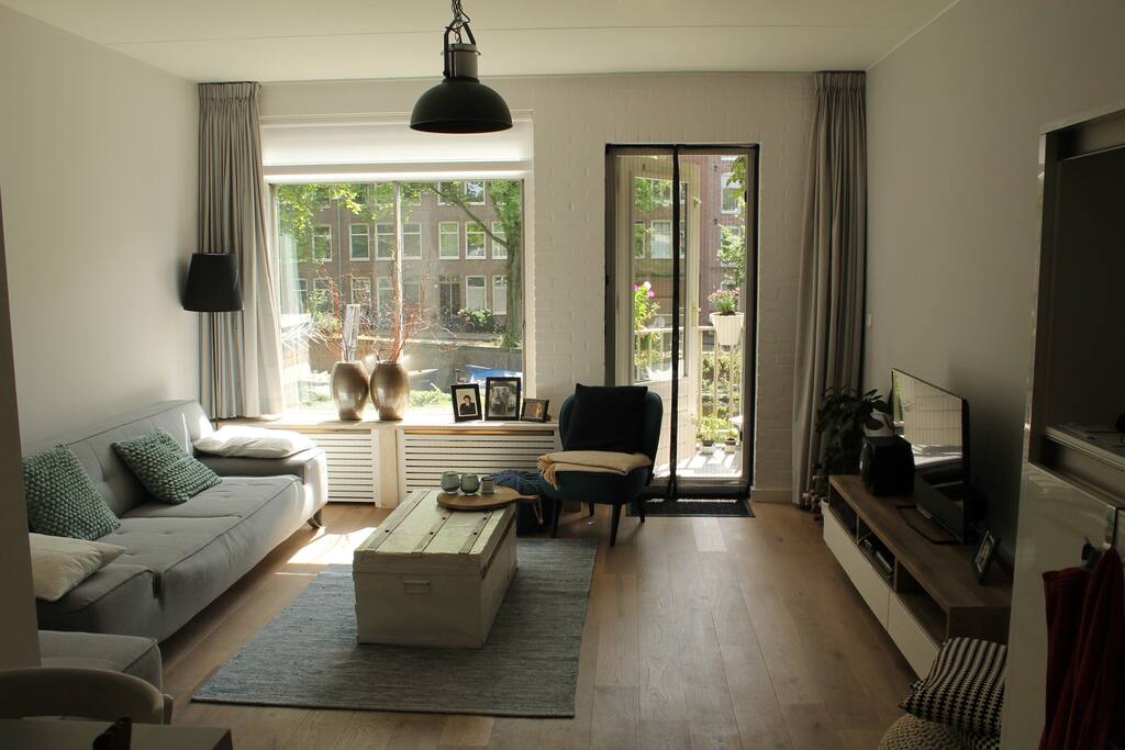 This is our living room with a real wooden floor.