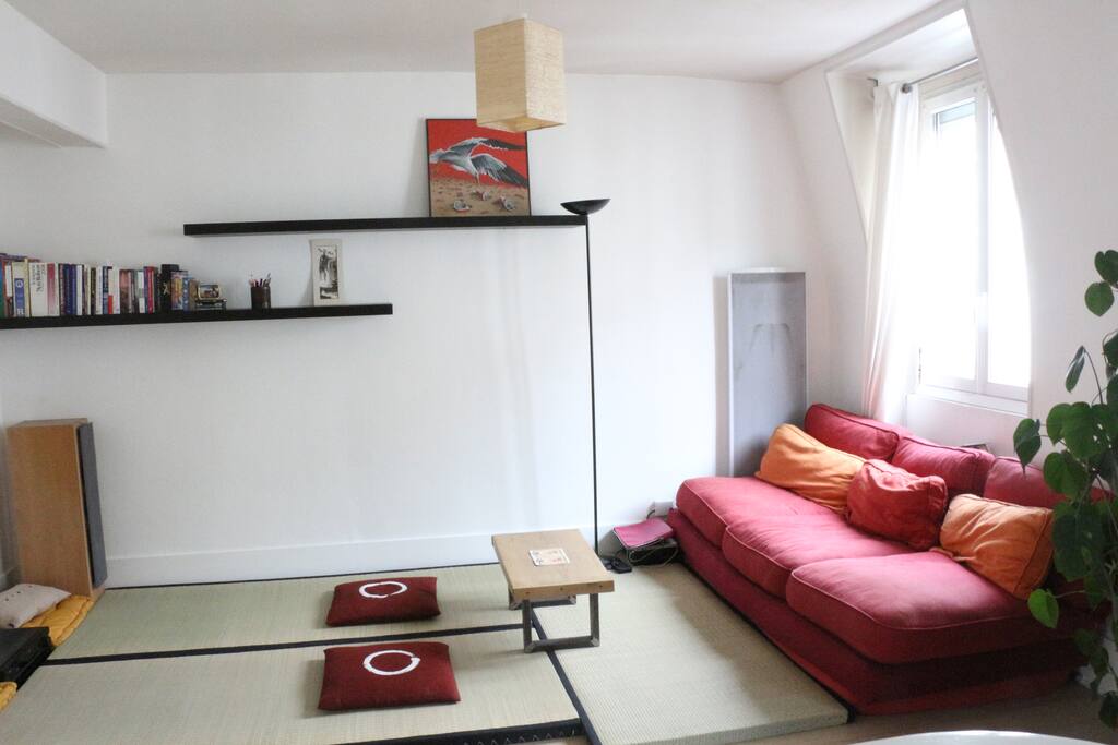 This is the living room. The sofa can be transformed into two single beds.