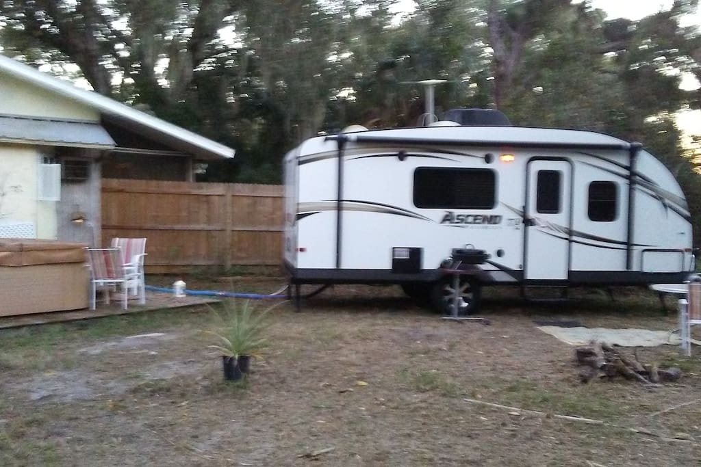 Camper is connected to fresh drinking water, sewer, and 30 amp electrical. Also has privacy fence around for total peace and quiet.