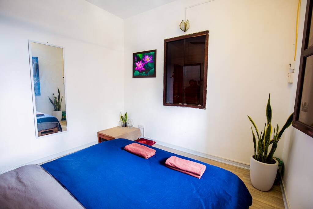 Brighten and airy bedroom with comfortable spring mattress