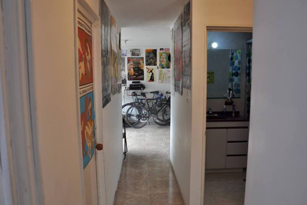 Hallway. Room to the left, shared bathroom to the right