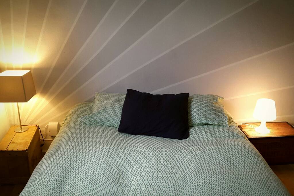 Your bedroom !
Nice bed. Confortable.
The room is luminous. Spacious. Cosy.
Equiped with a double ved. A sofa. A desk. Miror...etc.