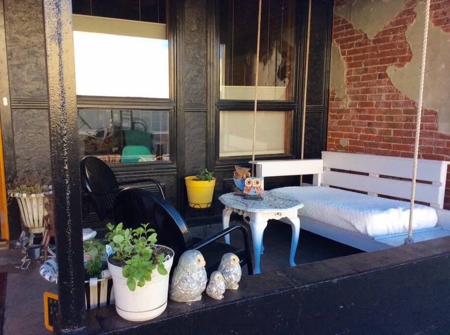 Front Porch - We have no yard, we are located right on the rural downtown road. You can enjoy your coffee, tea, or on our cozy little porch...