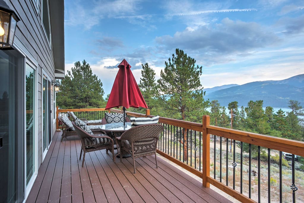 This 1,900-square-foot home boasts stunning mountain and lake views, with comfortable accommodations for up to 12 guests.