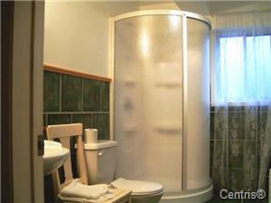 Main floor bathroom with washer and dryer