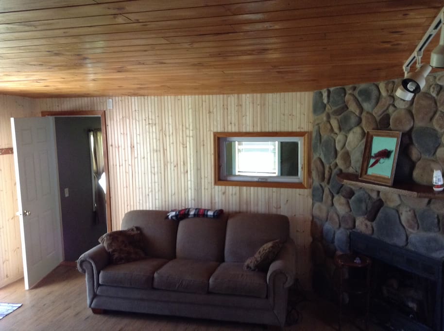 Living room addition with queen sleeper and sliding glass door