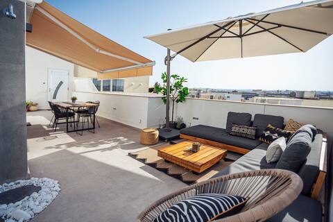 Luxury central top floor sunset studio penthouse