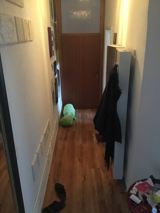 Opposite view, bathroom door to the right.