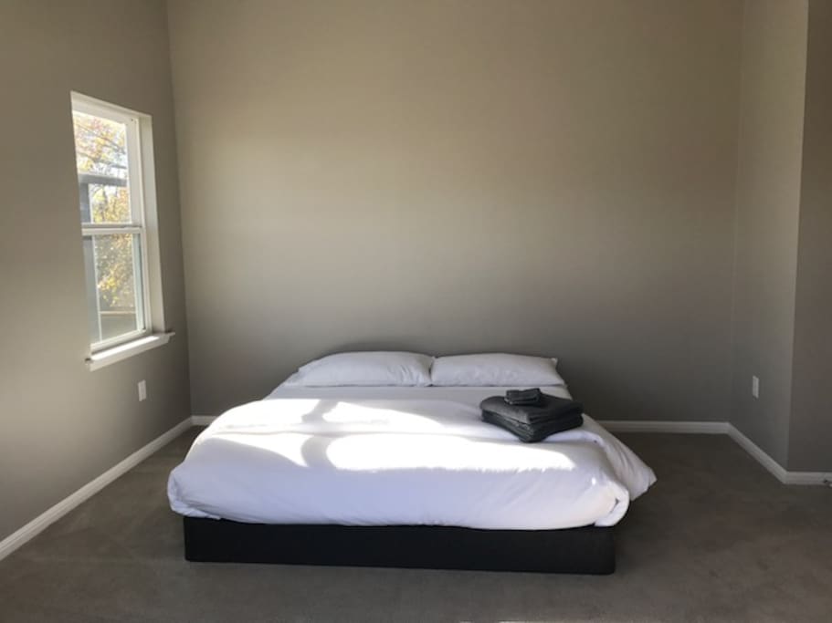 Bed 1 (4 total), huge King Size bed with brand new Casper Mattress. White sheets so you know they are perfectly clean!