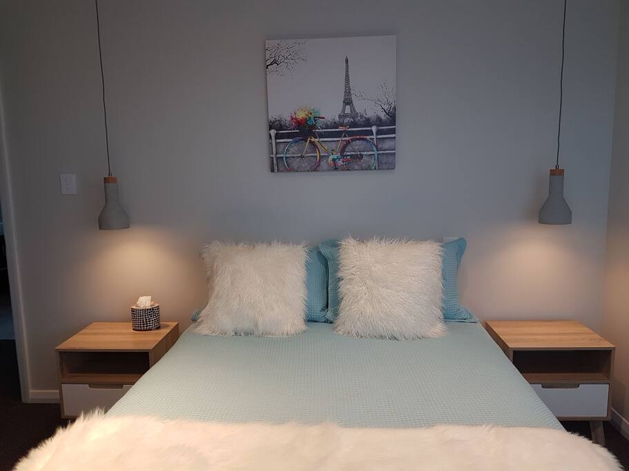 Light and modern main bedroom