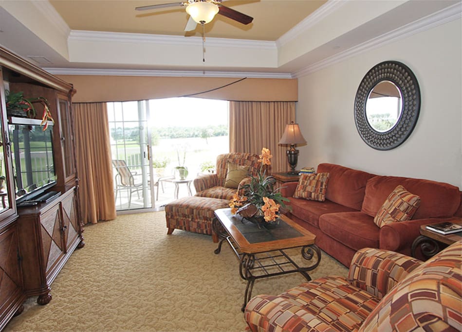 Living room with access onto private south-facing balcony.