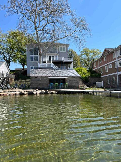 clear shallow sandy-bottom lake house + game room