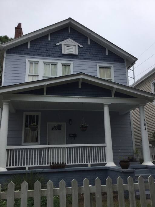 It's the blue house with the white picket fence"