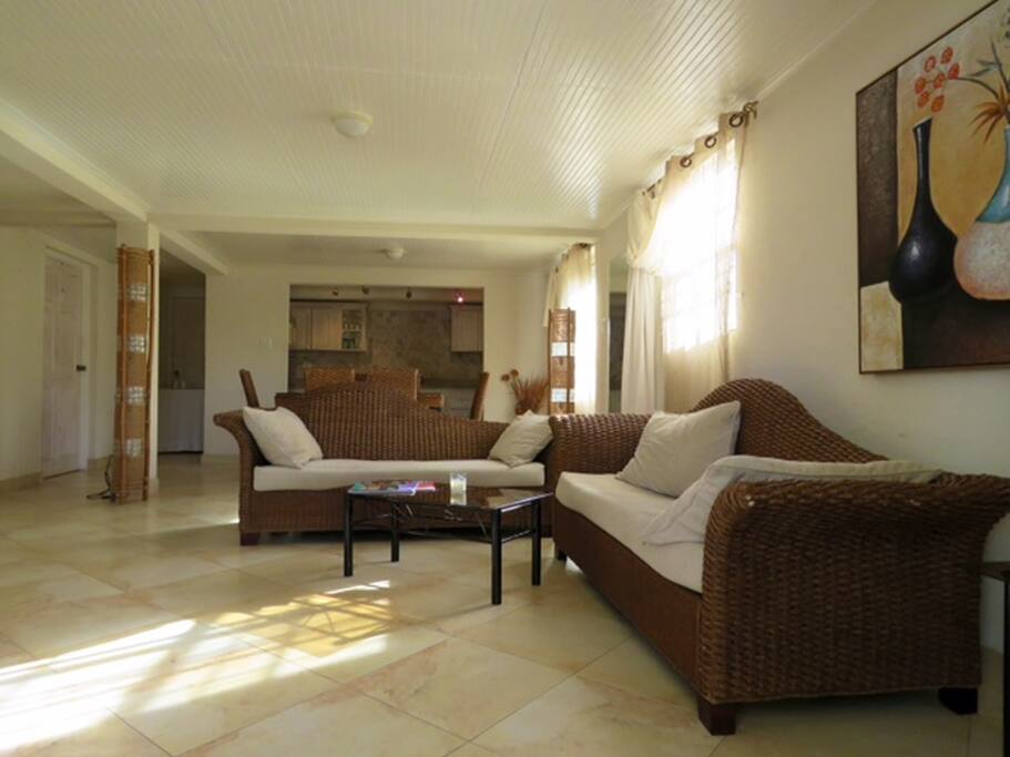 Spacious lounge with open plan kitchen