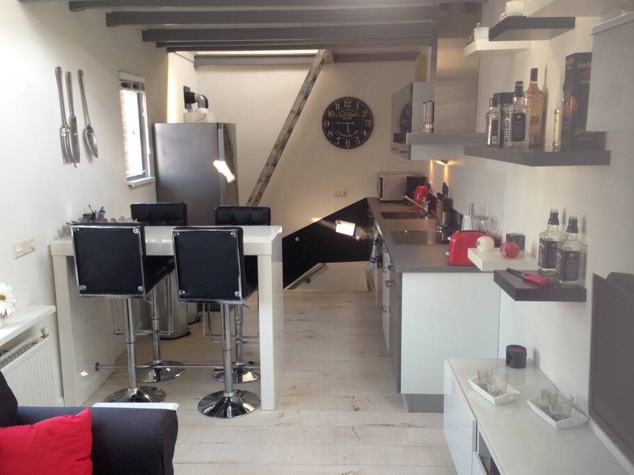 Kitchen and eating table. (1st floor)