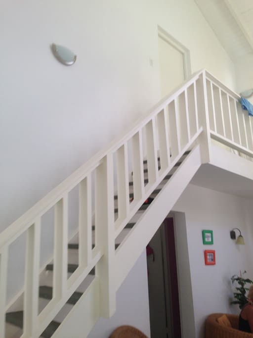 Steps to upper floor bedroom and terrace