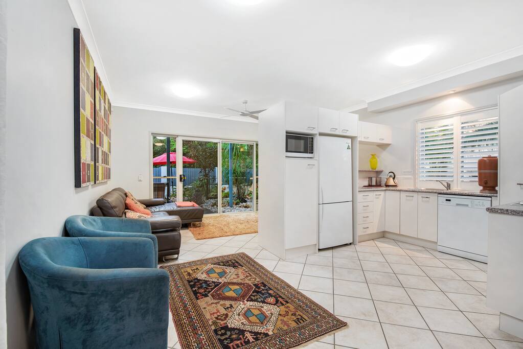 Open style kitchen, dining & lounge area overlooking the Japanese gardens & ponds