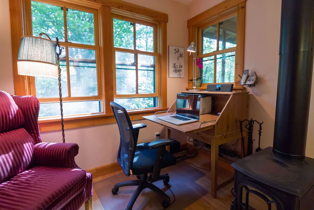 The drop-front desk gives you a place to write and is home to a printer and the WiFi router. (Photo by Camille Meehan)
