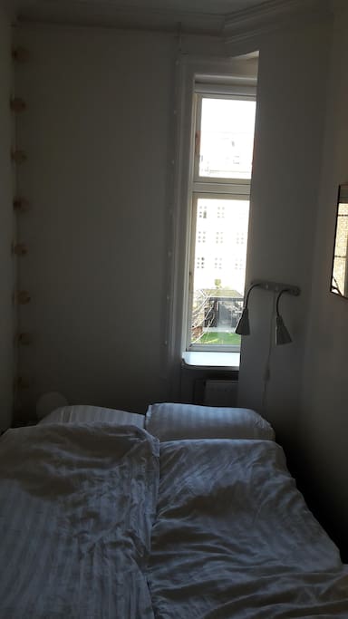 Small but cosy bedroom.
