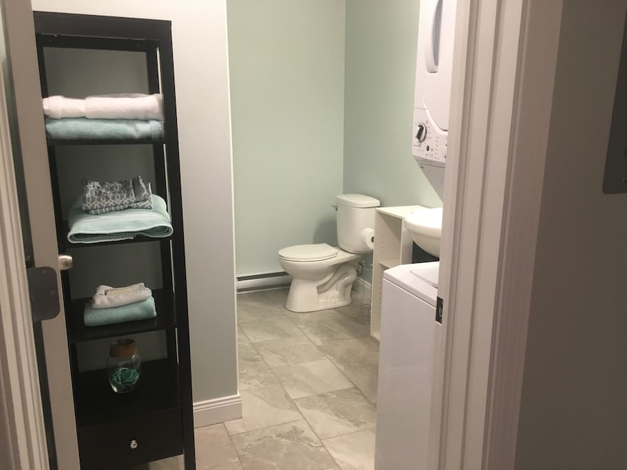 Linens/ towels in bathroom. Full bath/ shower.
