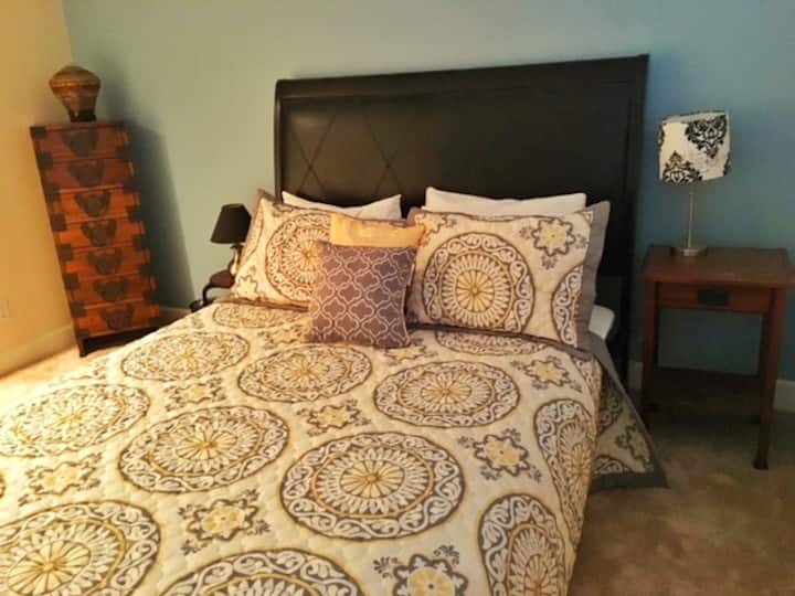 Comfortable queen bed with memory foam topper. 