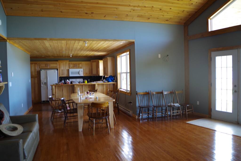 Open-concept dining, living and kitchen