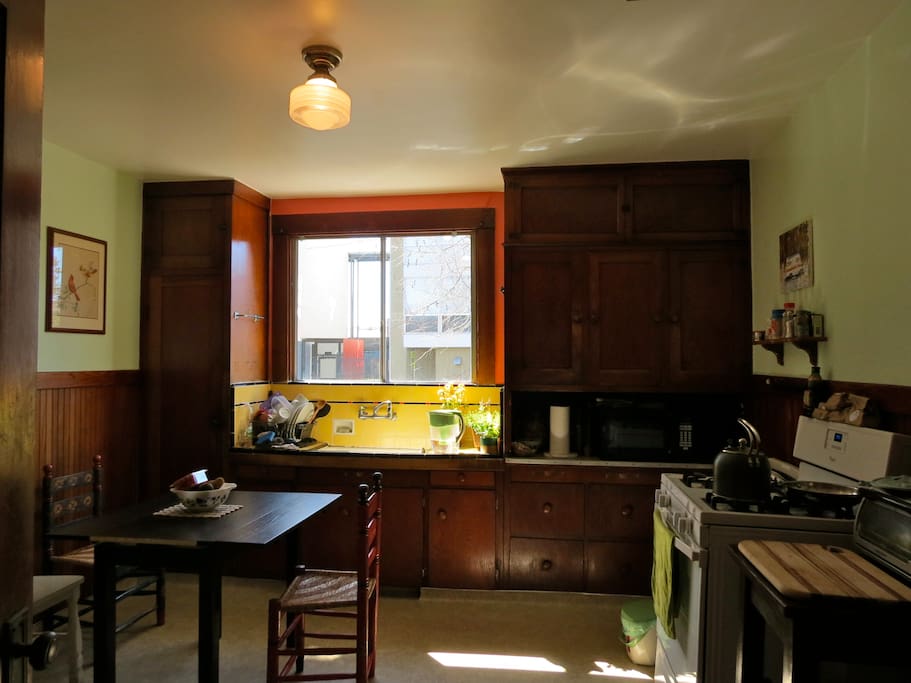 Spacious kitchen with microwave, toaster oven, rice cooker, Brita water filter, coffee, tea, and basics