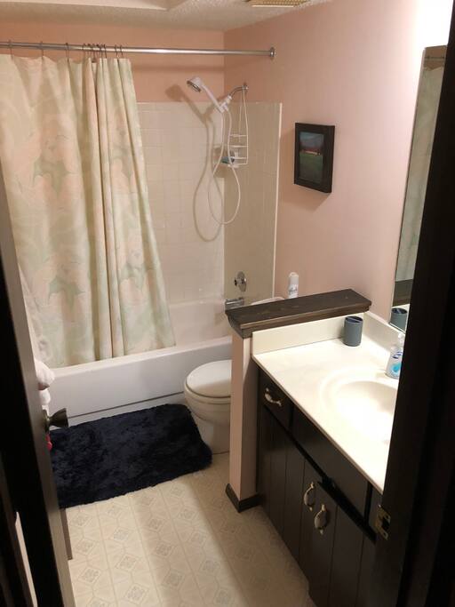 Full bathroom right across the hallway from the bedroom.