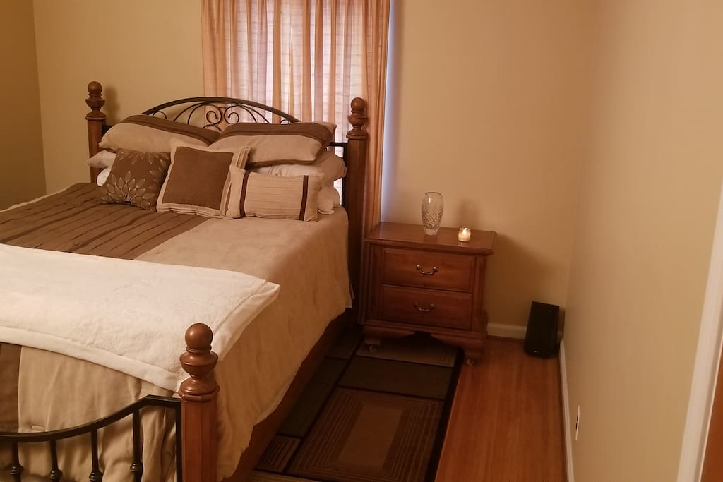 2nd bedroom with queen King Koil mattress and 3" memory foam topper.
