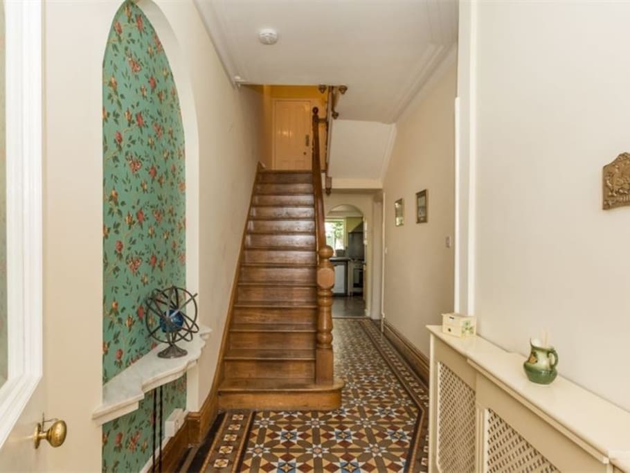 The hall, stairs leading to bathroom.