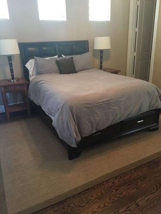 First floor bedroom with queen bed and Apple TV