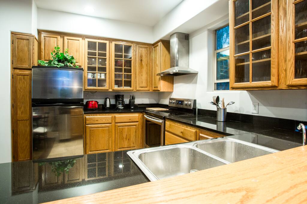 upgraded fully functional and stocked kitchen