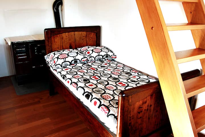 A small refurbished bed