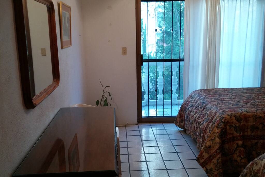 bedroom looking to balcony