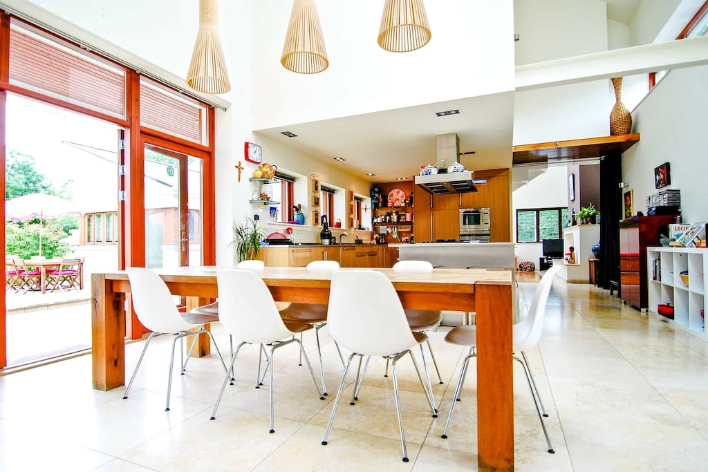 Kitchen and dining with door to patio