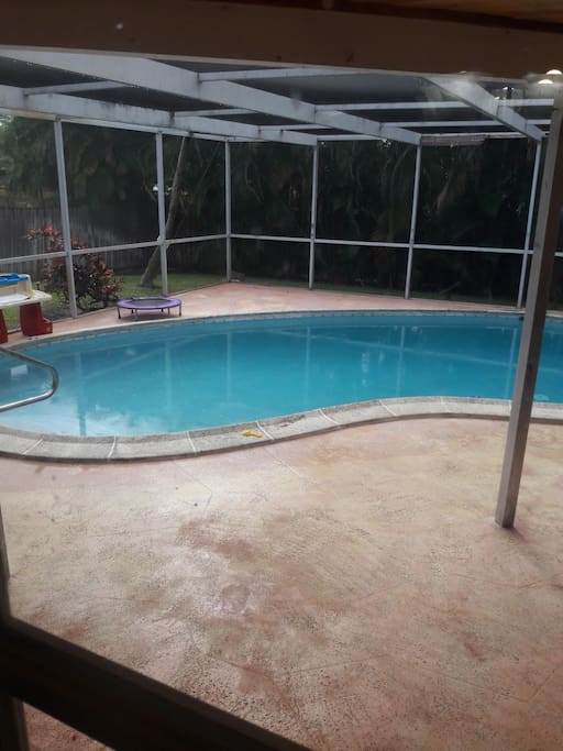 screened-in patio and pool