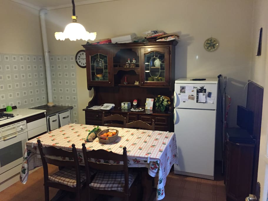 Rustic kitchen diner (shared) with cooker, Aga, large fridge/ freezer, TV with Italian & International channels.