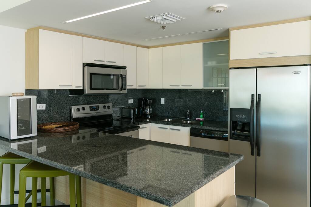 fully equipped kitchen with small wine cooler