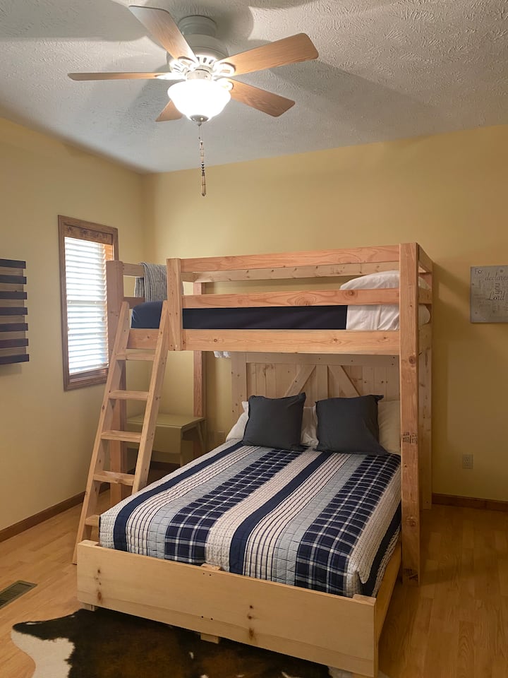 The second bedroom can host two on full size and has a twin bunk bed over, sturdy enough to host an adult. It’s like camp again!  Air mattresses, cots, and fold away bed that can all accommodate adults are found in the master closet if needed. 