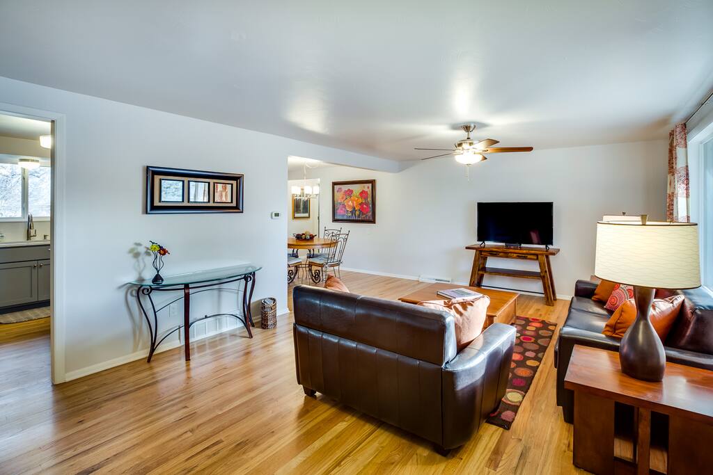 You will be warmly welcomed into our home with an inviting main floor living room complete with a 50" TV within view from the living room, dining room and kitchen.