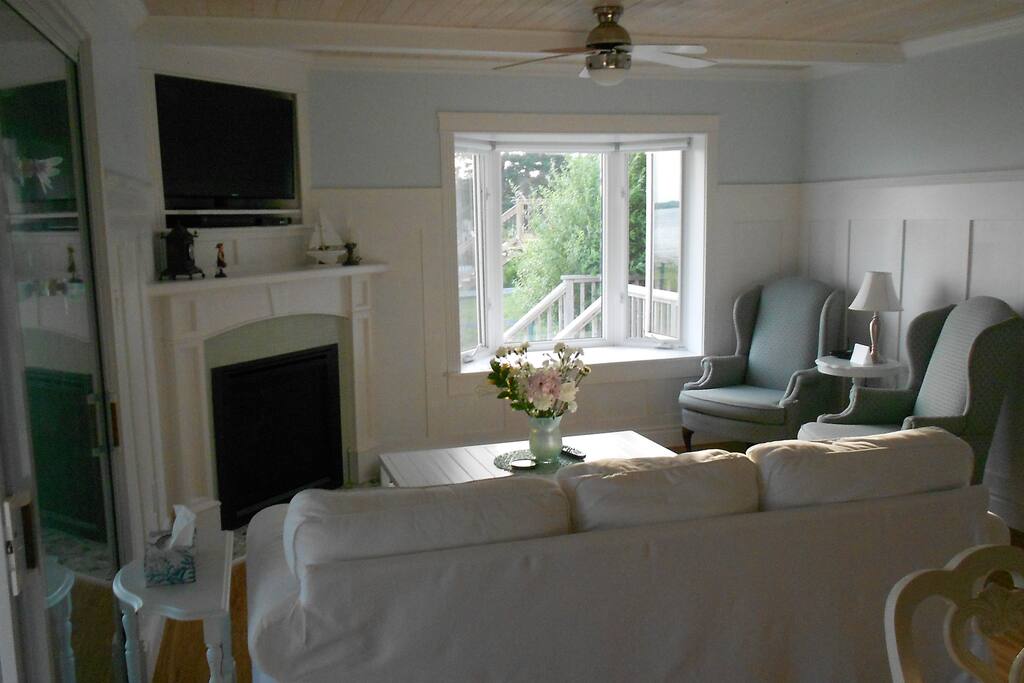 Living room: With the double view from these chairs, you won't miss the eagles, Herons or even the sailboats that might come into the bay.