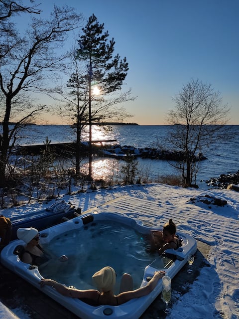 Nice lake view with pool, jacuzzi and sauna.