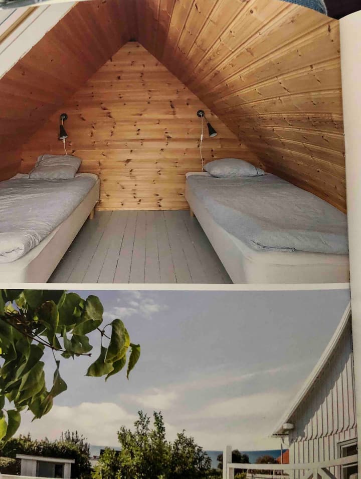 Sleeping loft in outhouse