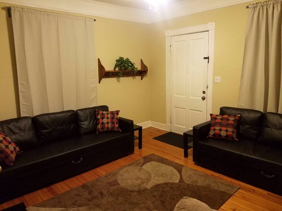 Living room, both couches fold out into queen beds.