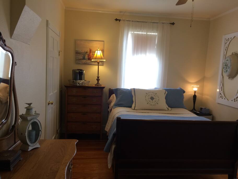 Cozy bedroom steps into connected 1 brdm suite.