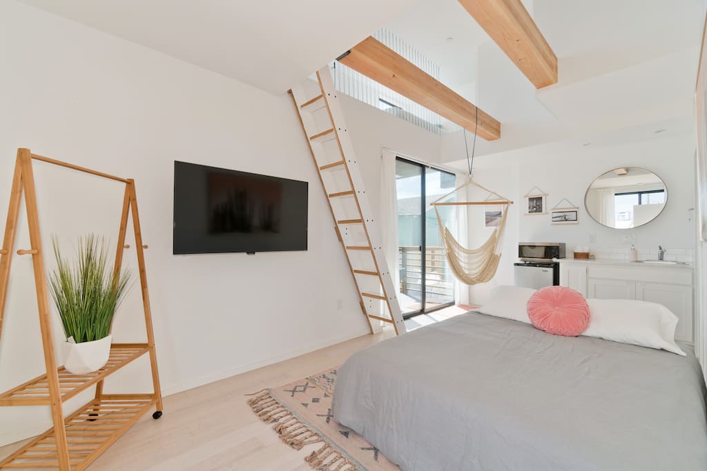 The sofa pulls out into a queen bed.