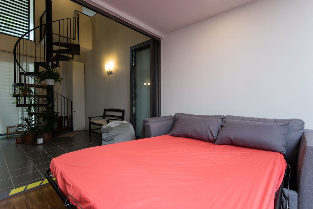 The sofabed provides extra sleeping space. The bi-fold doors can be closed to provide more privacy.