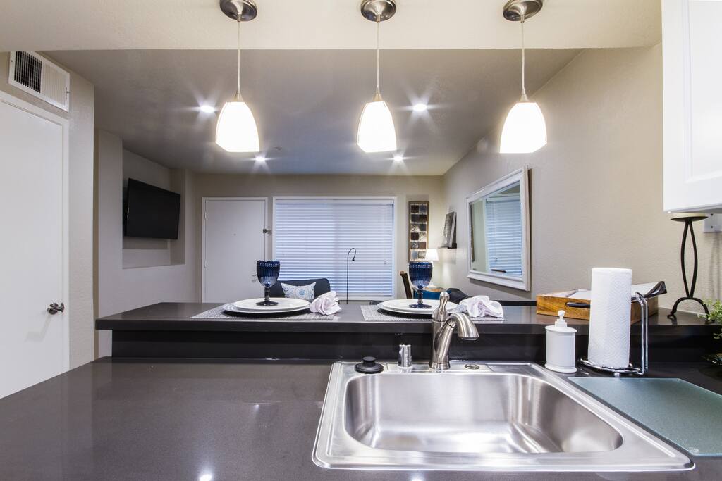 Notice this view of the Living Room from Kitchen Sink area you can also watch TV.