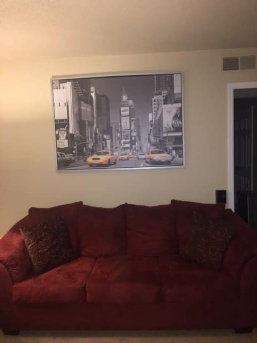 One of two comfy couches in the living room area